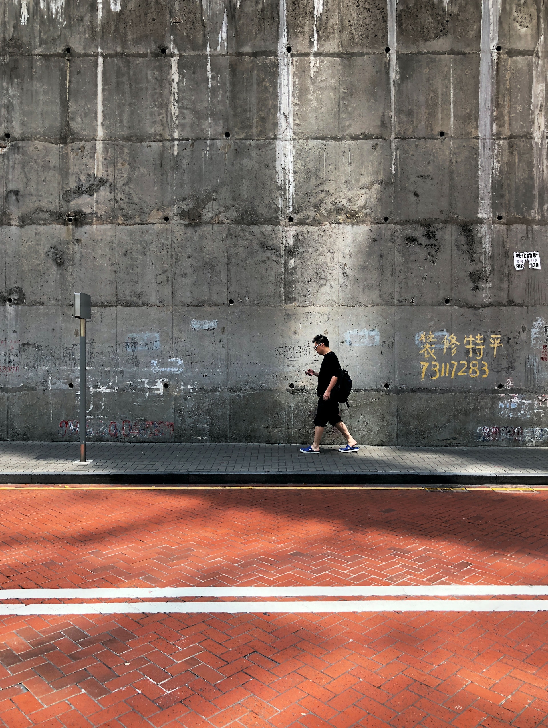 man about to face distracted walking consequences