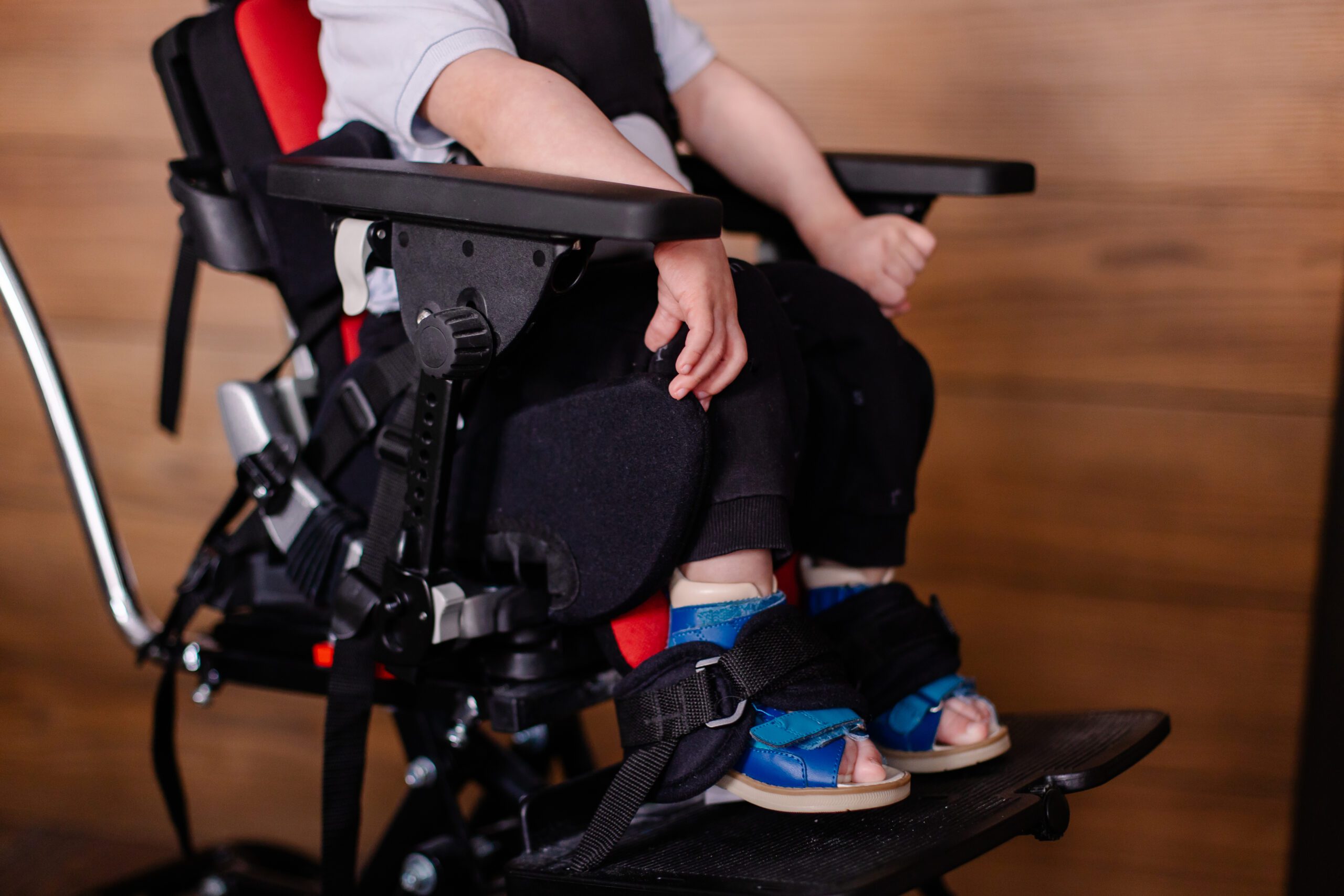 one of the children with sci on a wheelchair