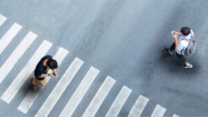 people engaging in pedestrian hazards