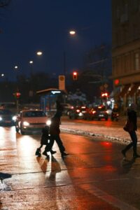 Pedestrians at night. Learn safety tips for pedestrians walking at night.