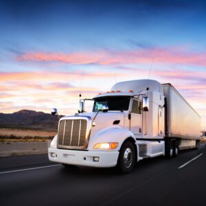 A truck on a highway. You can build a legal claim for compensation with a Riverside CA-91 truck accident lawyer.