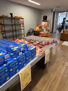 Omega Law Group and PATH volunteers created a festive setting at the Meal Kit Giveaway.