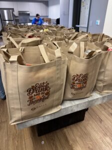 Omega Law Group and PATH volunteers gave away many meal kits for the holidays to families in need of support.