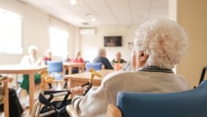 People in a nursing home. Learn why people sue nursing homes.